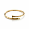 The Sculptural Gold Nail Cuff